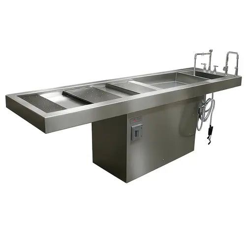 autopsy table with integral sink and head rest